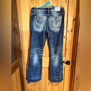 Miss Me Jeans size 30 waist, 32 inseam mid rise boot cut